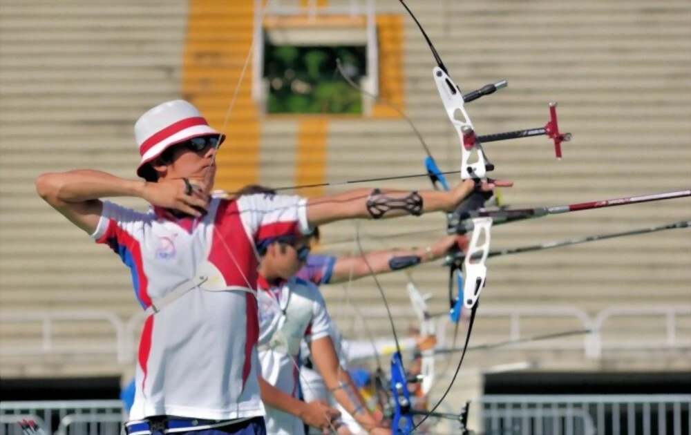 Why Do Olympic Archers Swing Their Bows?